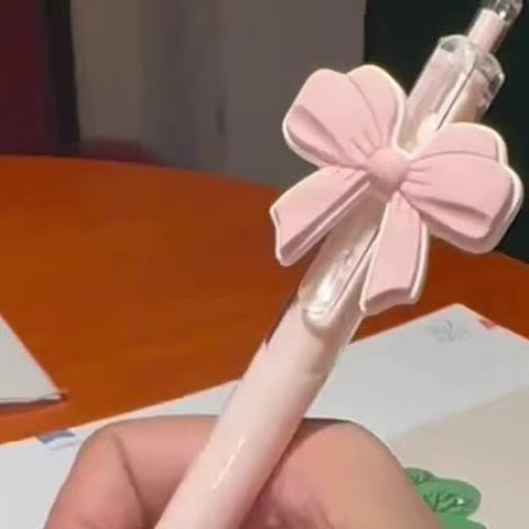 10 Stück rosa Gelstifte mit Schleifenknoten-Design als Klick-Kugelschreiber - Bild 6