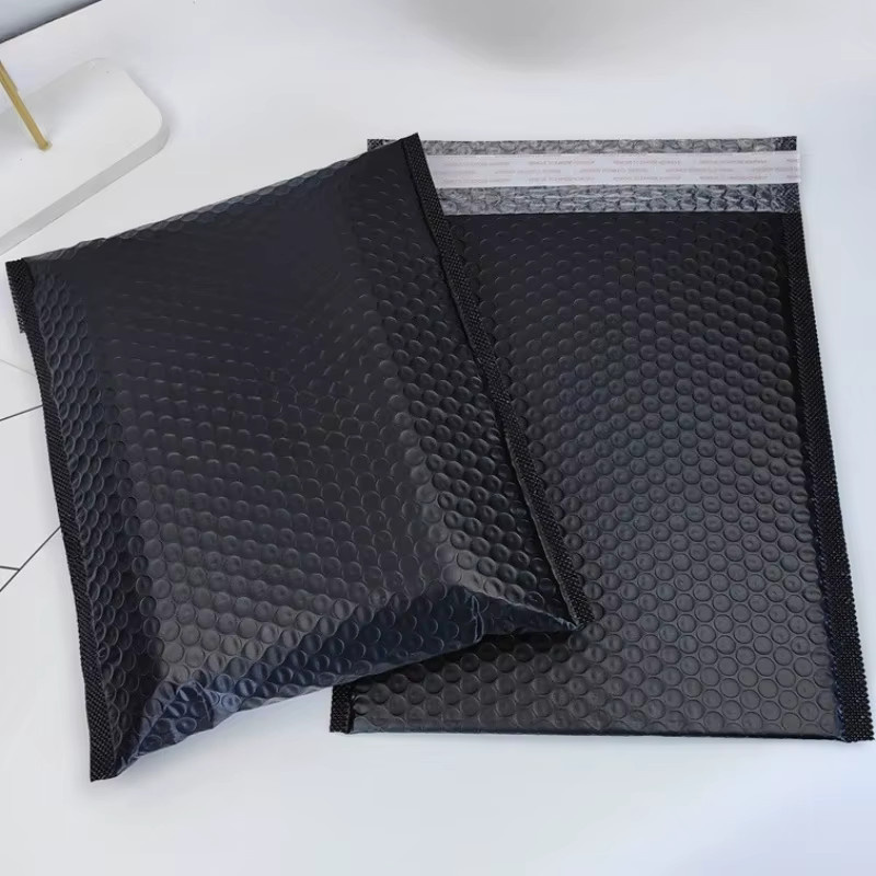 Selbstklebende Schaumstoff-Versandtaschen mit Luftpolsterfolie in Schwarz und Weiß - Bild 3