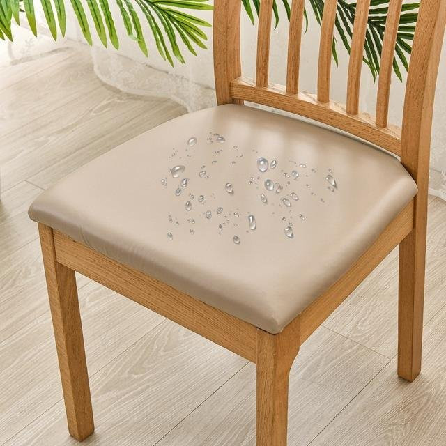 Elastischer Sitzbezug aus wasserabweisendem PU-Gewebe in Beige für Esszimmerstühle, schmutz- und ölbeständig - Bild 1