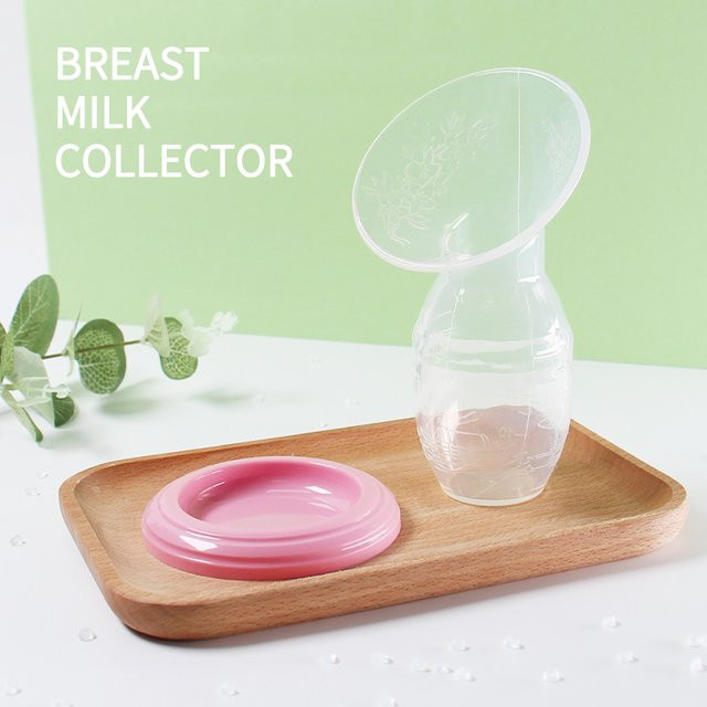 Manueller Muttermilch-Extraktor aus Silikon in Pink und Transparent für die Babypflege - Bild 1