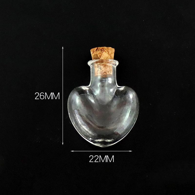 10 Stück Mini-Glasflaschen aus Borosilikatglas mit Korkstopfen in transparent, verschiedene Formen wie Herz, Stern und Kugel für deine Dekoration und Wunschgeschenke - Bild 1