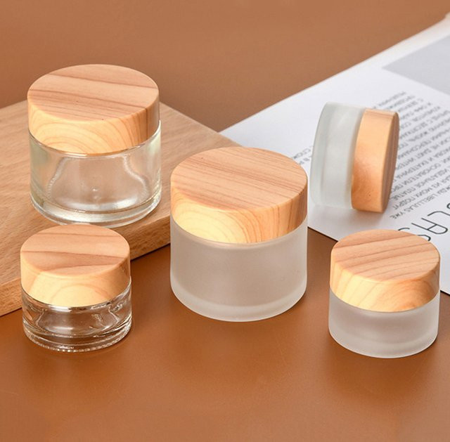 Mini-Glascremeflasche mit Holzmaserung und Kappe, 1-teilig - Bild 1