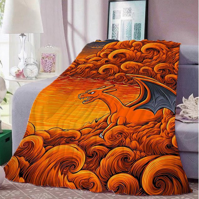 Flauschige Kuscheldecke Potdemiel mit Charizard-Motiv in Orange für Camping und Zuhause - Bild 1