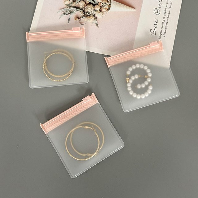 50 Stück Yidensy Schmuck-Aufbewahrungsbeutel aus Kunststoff in Rosa mit Reißverschluss für Zubehör, Perlen und Geschenke - Bild 1