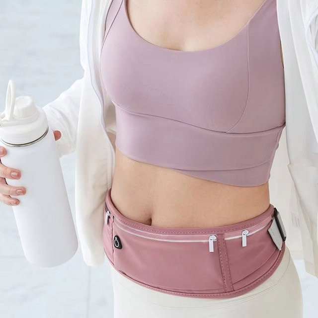 Wasserdichte unsichtbare Laufgürtel Tasche von KAFNHCKA für Sport und Handy in Blau oder Pink - Bild 1