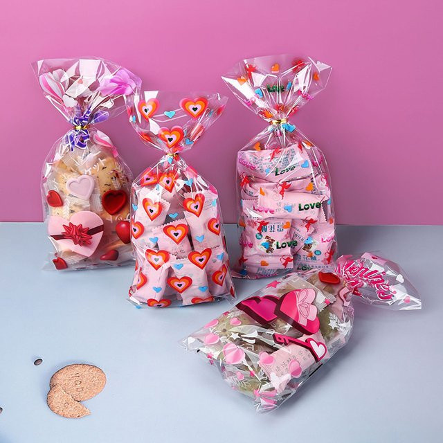 WEIGAO Zellophan Geschenktüten mit rotem Liebesherz für Valentinstag und Hochzeiten, 50/100 Stück - Bild 1