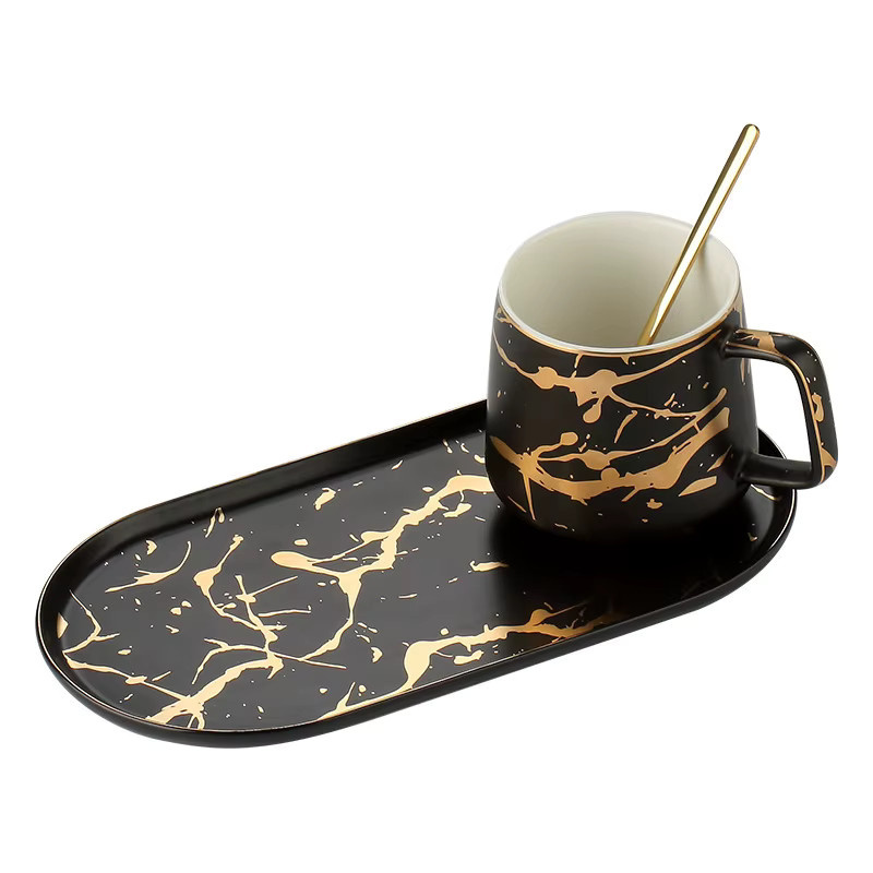 Nordisches Keramik-Set aus Porzellan mit marmoriertem Design, bestehend aus Milchbecher, Kaffeetasse, Untertasse und Frühstücksteller in Multicolour, Grün und Schwarz - Bild 3