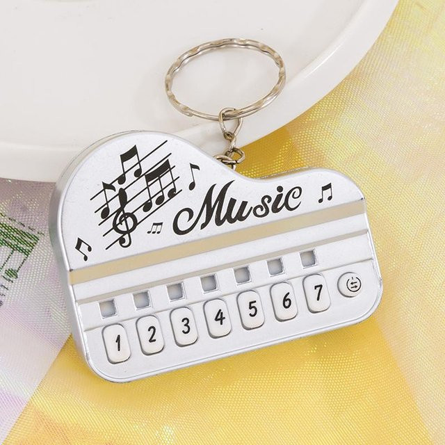 Linyi toy car Mini-Elektronenklavier-Schlüsselanhänger, Musikspielzeug, leuchtend, ab 14 Jahre - Bild 1