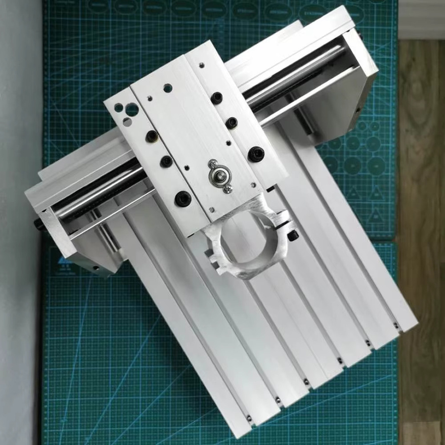 XMSJ Mini CNC Graviermaschine 3020 DIY Rahmen Kit aus Aluminium in Silber mit 1605 Kugelumlaufspindel und Nema23 Schrittmotorhalterung, Hub: H 7,0 cm x B 20,0 cm x T 30,0 cm - Bild 3