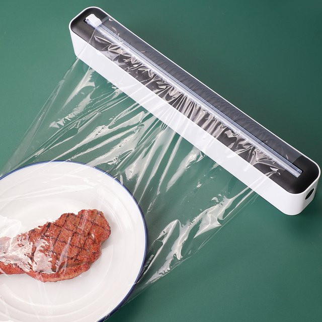Multifunktionales Küchen-Versiegelungswerkzeug aus Kunststoff für Frischhaltefolie, Aluminiumfolie, Backpapier und Wachspapier in Grün-Weiß, Breite: 36,0 cm - Bild 1