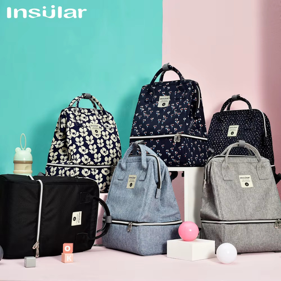 Grauer Umstandsrucksack mit großem Fassungsvermögen, mehreren Fächern und Kinderwagenhaken als Baby-Wickeltasche und Stillbeutel - Bild 2