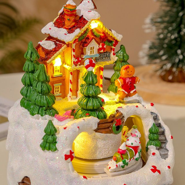 Qiilu YL-2347 Leuchtendes Musik-Schneehaus mit rotierendem Musikzug in Rot und Multicolour als kreatives Weihnachtsornament - Bild 1