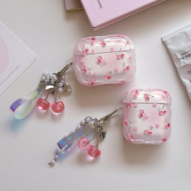 Stoßfeste Apple AirPods Schutzhülle mit Kirschstern-Design und Wellenrand in Rosa - Bild 1