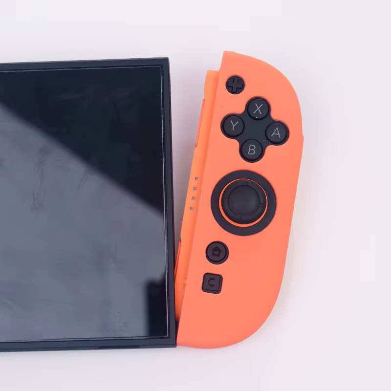 Nintendo Silikonhüllen-Set für Switch 2 mit Joy-Con Controller Schutzhüllen und Daumengriffen in Blau und Orange - Bild 3