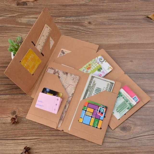 Aktenordner aus Kraftpapier in Braun für nachfüllbare Reisetagebücher und Reisepass-Organizer mit Ringbindung - Bild 1