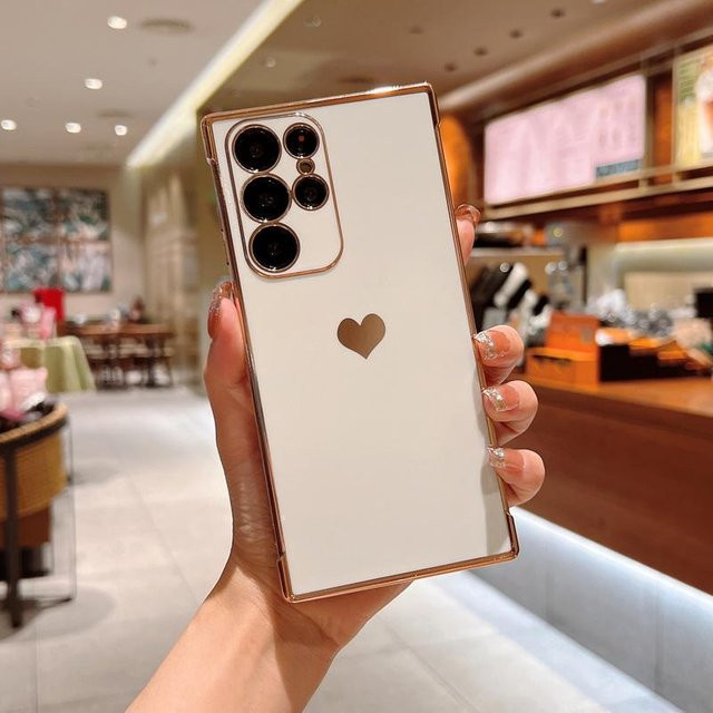 Luxus Silikon Handyhülle mit vergoldetem Liebesherzmuster für Samsung Galaxy S24 Ultra, S24 Plus, S25, S24 FE, S23, A55, A54, A53 5G in Gold und Weiß - Bild 1