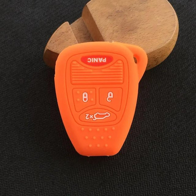 Silikon Schlüsselhülle für 4 Tasten Klapp-Fernschlüssel passend für Dodge, Jeep Commander, Grand Cherokee, Chrysler Aspen und 300 in Orange - Bild 1