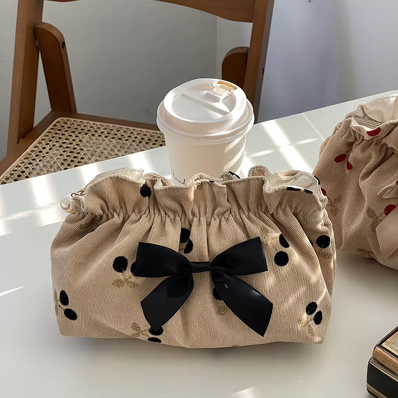 Weiche Cord-Make-up-Tasche mit Schleife als Baby-Windel-Organizer und Damen-Clutch in Schwarz oder Beige - Bild 3