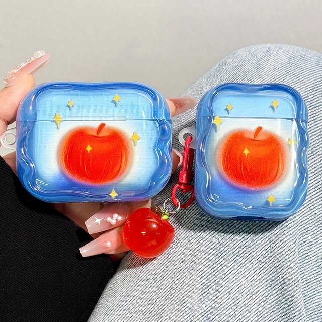 Silikon Kopfhörerhülle im Apple Juice Design für Apple AirPods 4, 3, 2 und Pro 2 mit Charm in Blau - Bild 1