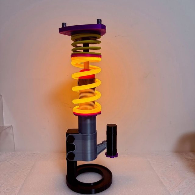 Potdemiel Stoßdämpfendes Feder-Nachtlicht als kreative Auto-Ambientebeleuchtung und Desktop-Dekoration in Multicolour - Bild 1