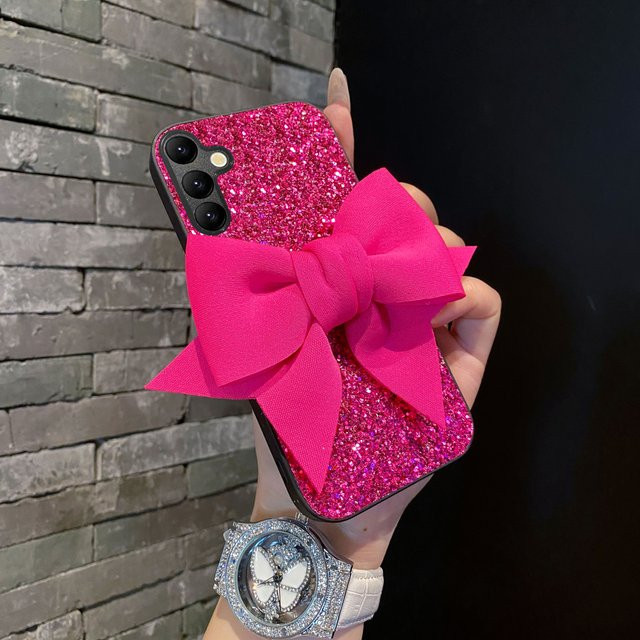 Modische Samsung Handyhülle mit Stoff-Schleife und glitzerndem Leder für Galaxy S25 Ultra S24 S23 S22 Plus FE S26 Edge in Rot oder Pink - Bild 1