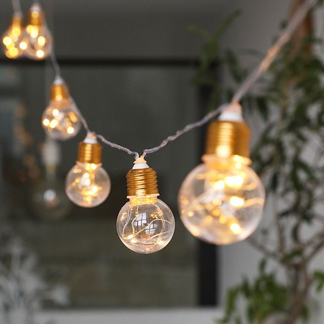 LED Lichterkette mit Glühbirnen in warmweiß, batteriebetrieben, transparent, modern für Innen und Außen - Bild 1
