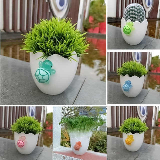 Eiförmiger Blumentopf aus Kunststoff in Weiß, B/H: 10 x 9,5 cm - Bild 1