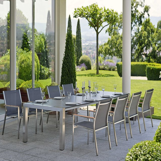 Stern Cardiff Essgruppe aus Edelstahl mit 8 Stapelstühlen und Ausziehtisch in Silverstar mit Tischplatte Dekor Zement hell, B/T/H: 214 x 100 x 75 cm bis 294 x 100 x 75 cm - Bild 1