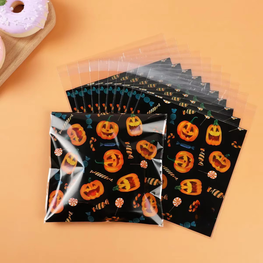 50 Stück Halloween Süßigkeiten Taschen aus Kunststoff mit Kürbis und Geist Motiven zur Party Dekoration - Bild 4