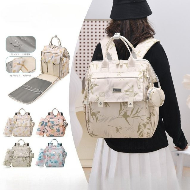 Multifunktionaler wasserdichter Baby Rucksack und Windeltasche für unterwegs in Multicolor - Bild 1
