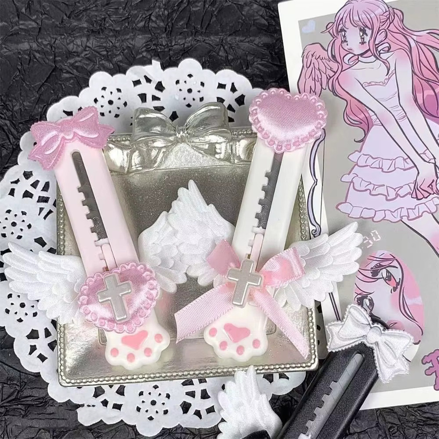 Einziehbarer Mini Cartoon Papierschneider in Katzenform aus Kunststoff, Farbe Pink, für Schule und Büro - Bild 2