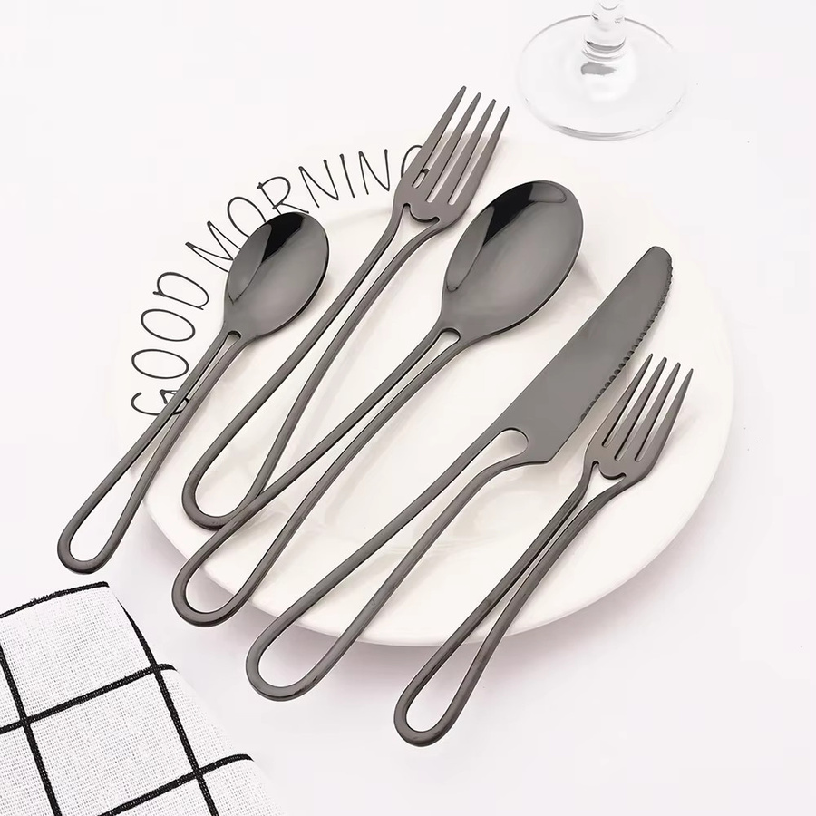 16-teiliges Besteckset aus Edelstahl von Uniturcky in Schwarz und Silber mit Hollow-Handle-Design, bestehend aus Messern, Gabeln und Löffeln - Bild 1