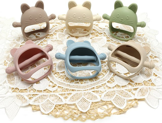 BPA-freier Silikon Beißring in Handschuhform für Babys zur Zahnpflege und Linderung beim Zahnen - Bild 1