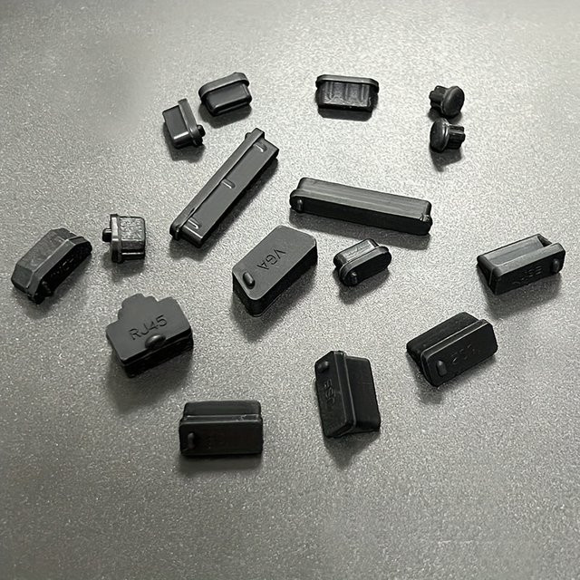 16 Stück Universal Staubstecker Set für Notebooks in Schwarz, passend für Xiaomi, USB-A, USB-C, HDMI und DisplayPort - Bild 1