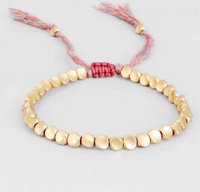 Ribbonka Armband, tibetisches geflochtenes Strick-Kupferperlen-Glücksseil, gold, Unisex - Bild 1