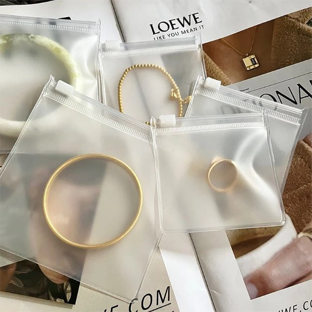 10 Stück transparente Schmucktaschen aus Kunststoff mit Reißverschluss für Ohrringe, Ringe und Halsketten zur Reiseaufbewahrung - Bild 1