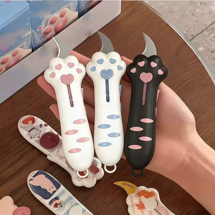 Einziehbarer Katzenkrallen Schlüsselanhänger als Mini-Paketöffner und Universalmesser in Pink - Bild 3