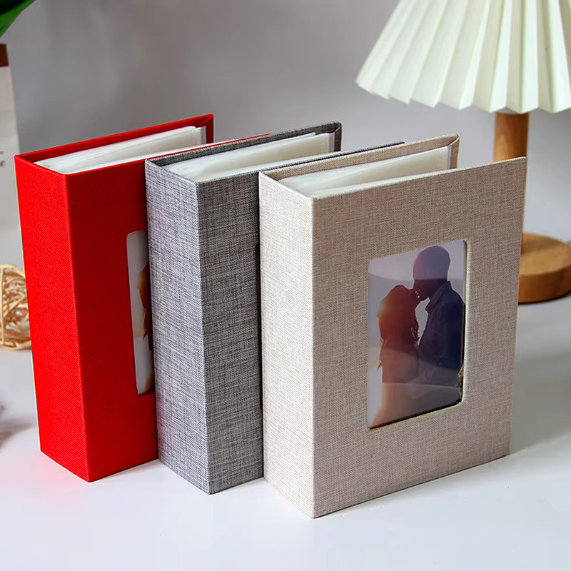 Fotoalbum mit 100 Taschen für 4 x 6 Fotos in Blau mit Leinenhülle und beschreibbarer DIY-Aufbewahrung - Bild 1