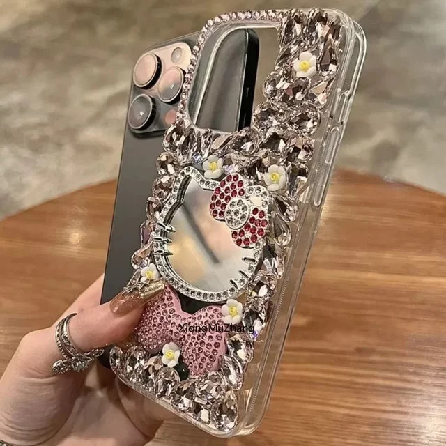 Sanrio Hello Kitty iPhone Hülle mit Make-up-Spiegel, Blumen, Schleife und Strasssteinen für iPhone 17 bis 11 Pro Max - Bild 1
