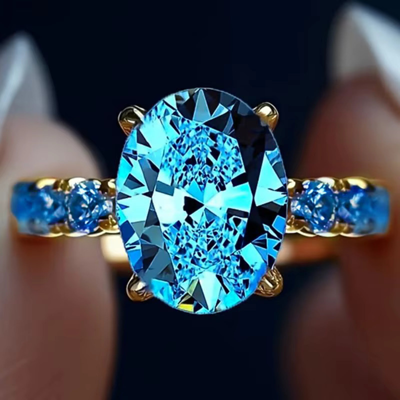 Huitan Damenring, goldfarben, blauem Zirkonia - Bild 3