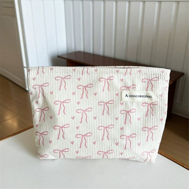 Reise-Make-up-Tasche aus Cord mit Schleifenmuster als Kosmetiktasche und Kulturbeutel mit Reißverschluss - Bild 1