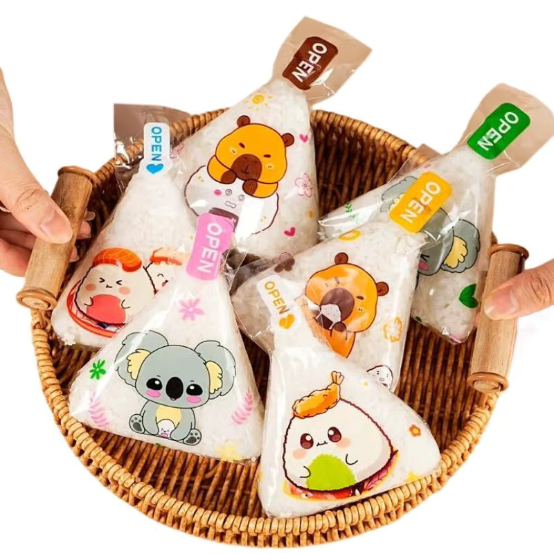 50 oder 100 Stück transparente Dreieck Onigiri Sushi Taschen mit Cartoon Capybara Motiv aus Kunststoff für Bento und Reisbälle - Bild 6