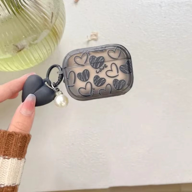 Sanrio Schutzhülle mit Herz-Design für AirPods Pro 2, AirPods 4 (2024), AirPods 3, 1 und 2 Gen in Schwarz mit Haken - Bild 2