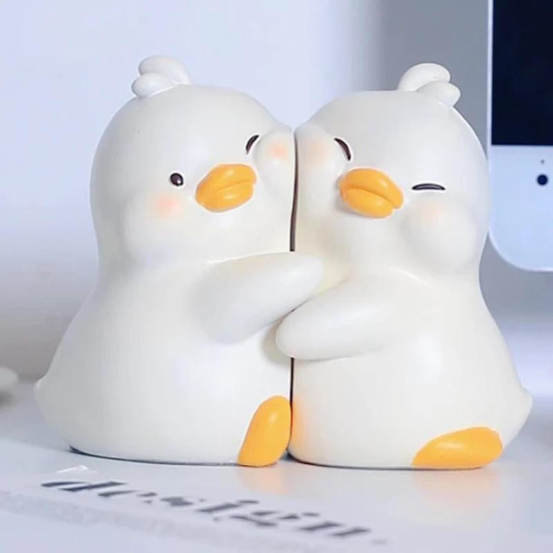 2er-Set Niedliche Enten Buchstützen aus Harz als dekorative Tier-Statuetten für dein Büro oder Schlafzimmer - Bild 1