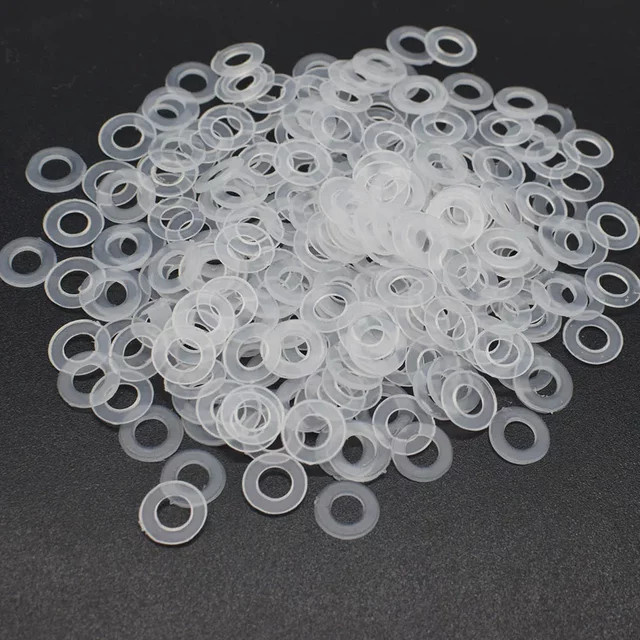 Transparente Nylon-Unterlegscheiben als isolierende Kunststoff-Ösen und Dichtungsringe für Knöpfe und Befestigungen - Bild 1