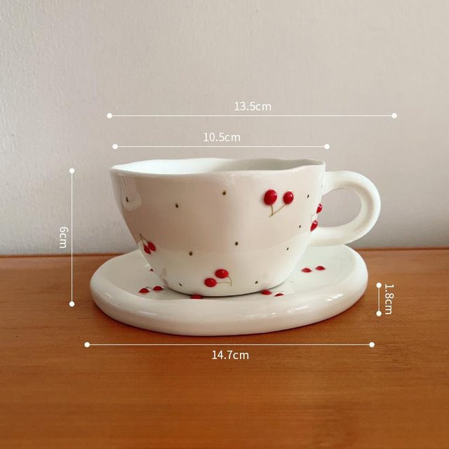 Handgekniffte Keramik-Kaffeetasse mit Unterteller im Kirsch-Design, Grau, 300 ml - Bild 1
