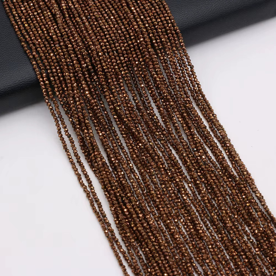 Abstandshalter Naturstein, dunkelgelb, rund, facettiert, 2 mm - Bild 2