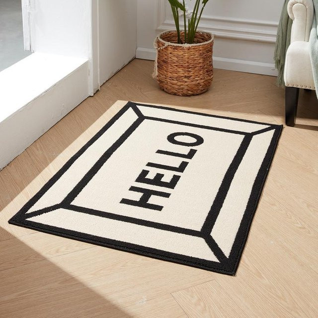 Rutschfeste und saugfähige Fußmatte aus Polyester in Weiß, B/B: 80 x 50 cm - Bild 1