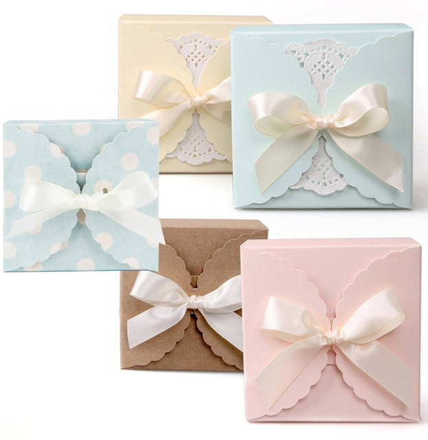 10 Stück Casame Kraftpapiertüten mit Schleife für Geschenke und Süßigkeiten in Weiß, Rosa, Hellblau und Beige - Bild 1