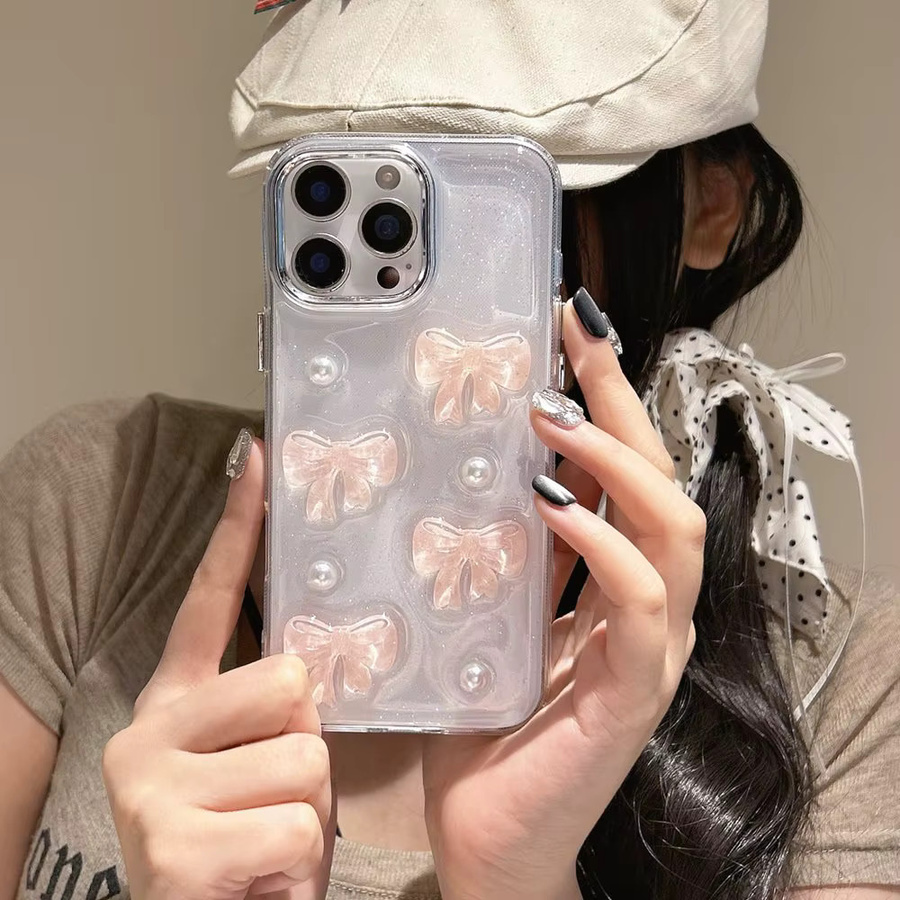 Transparente NUOCDE Handyhülle mit rosa 3D Schleife und Perlen für iPhone 11 bis iPhone 16 Pro Max, stoßfest und süßes Design - Bild 2